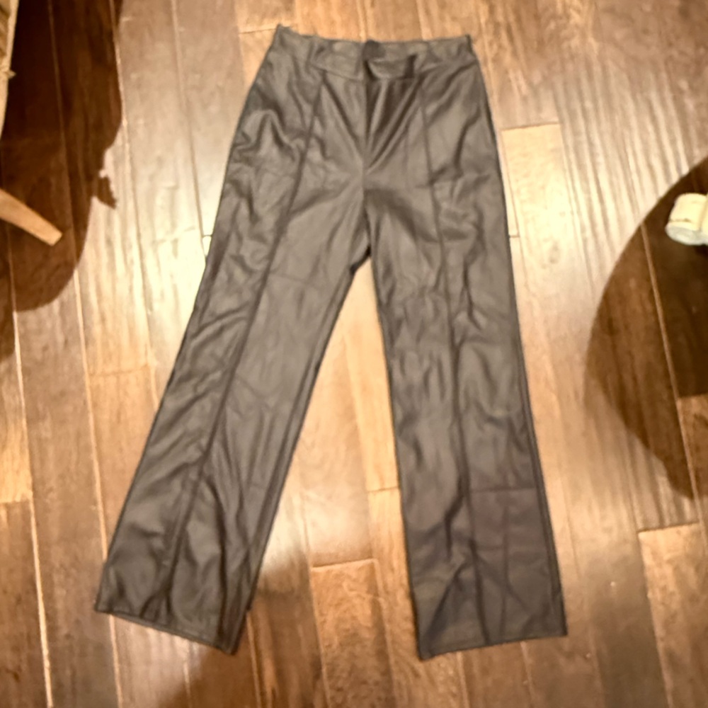 Black faux leather long wide leg pant.